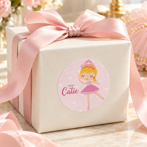 Gift box tied with a blush ribbon and finished with a personalized ballerina label