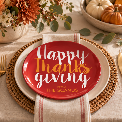 Red and orange Thanksgiving personalized plate with the name of the family written on it