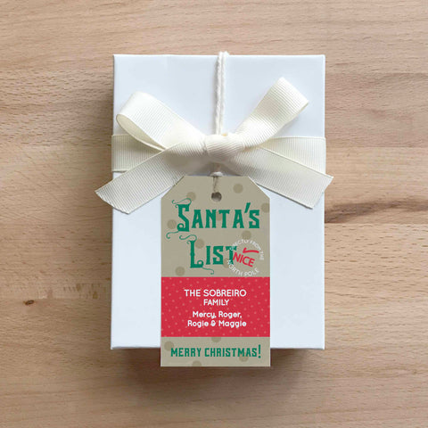 Personalized Santa's List stringed gift tag printed with a name
